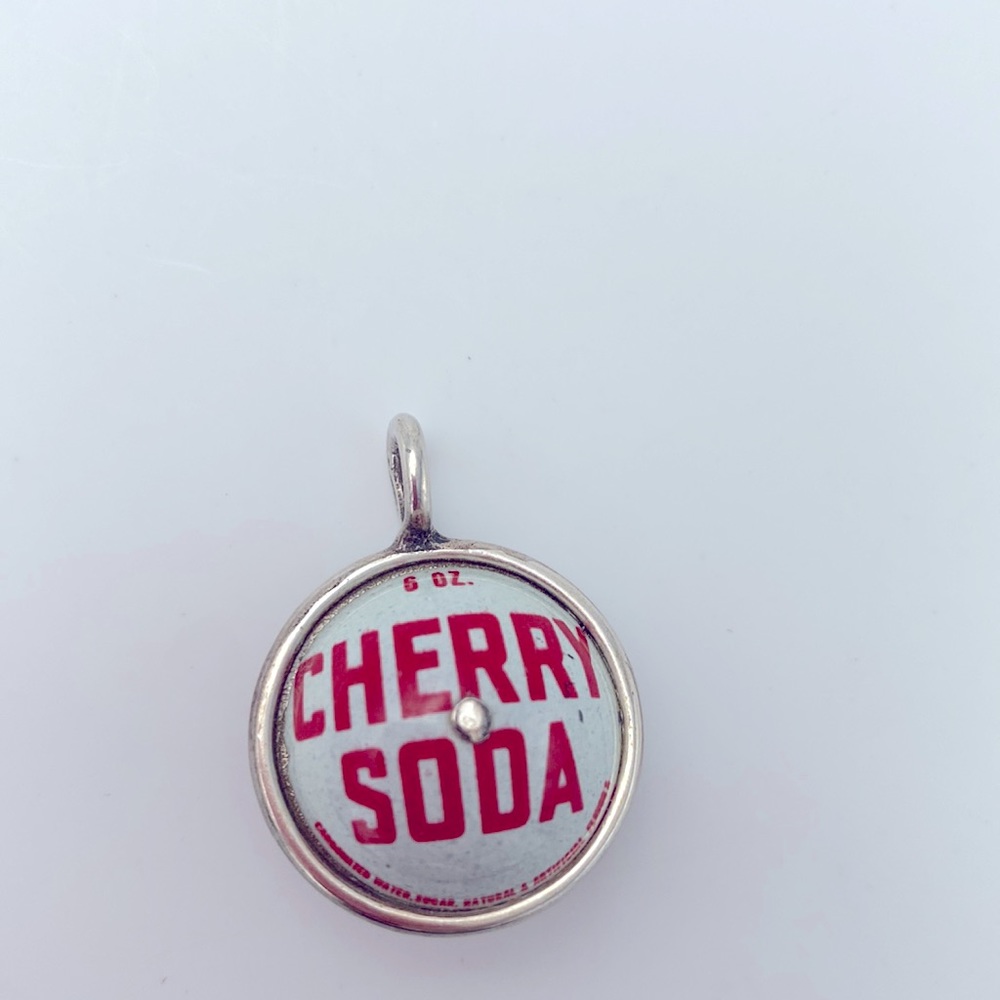 Unique pendant with vintage look cherry soda signs on both sides